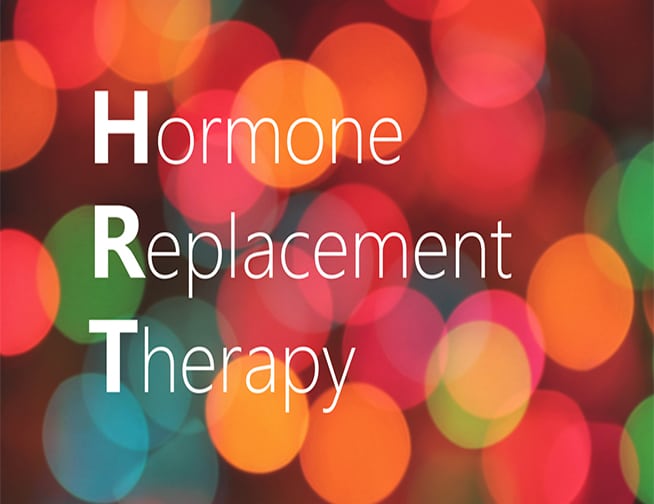 BHRT - Bio-Identical Hormone Replacement Therapy, represented by hormone capsules and a leafy green background.