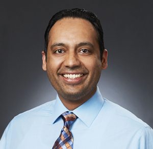 Portrait of Dr. Harveer Parmar MD, a dedicated and experienced healthcare professional.