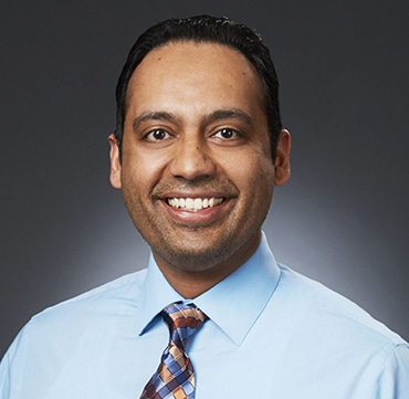 Portrait of Dr. Harveer Parmar MD, a dedicated and experienced healthcare professional.